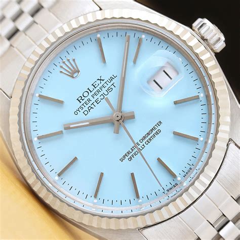 silver rolex with blue face